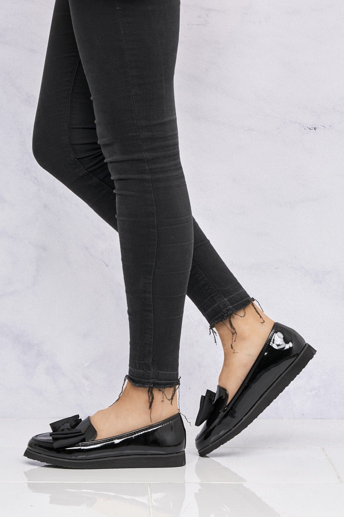 Ada Bow Detail Cleated Flatform Sole Loafers in Black Patent - Image 3