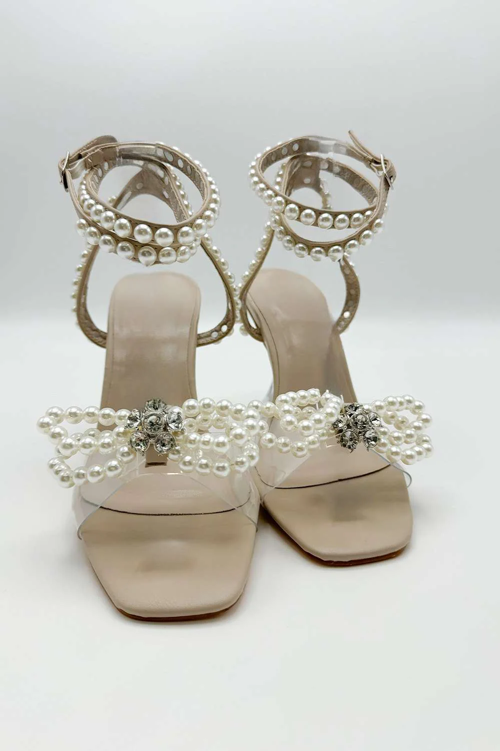 Pearlie Perspex Faux Pearl Bow Detail Heeled Sandals in Nude - Image 4