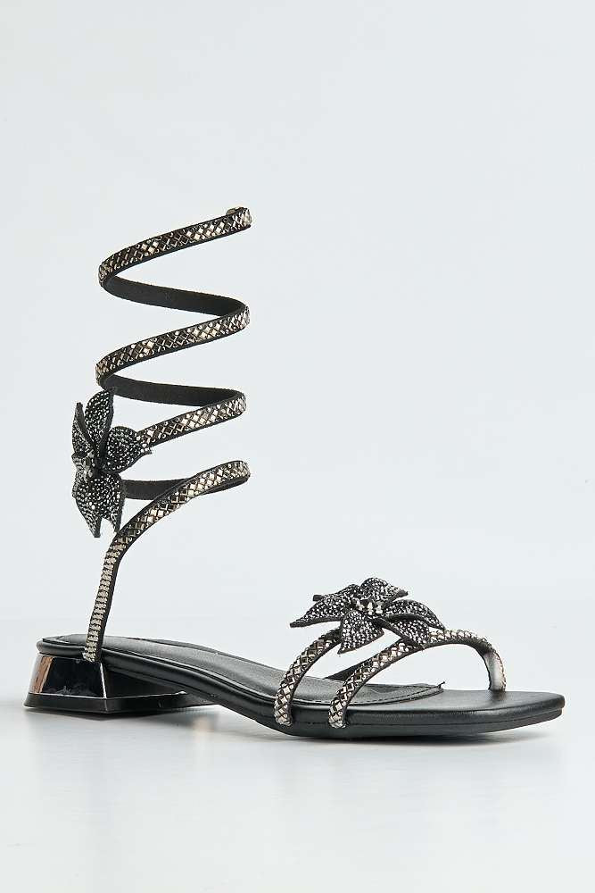Tansel Diamante Flower Embellished Wrap Around Flat Sandals in Black - Image 4
