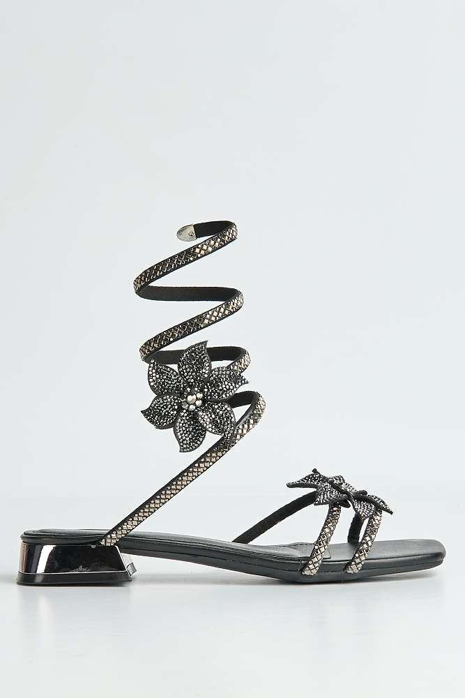 Tansel Diamante Flower Embellished Wrap Around Flat Sandals in Black - Image 6