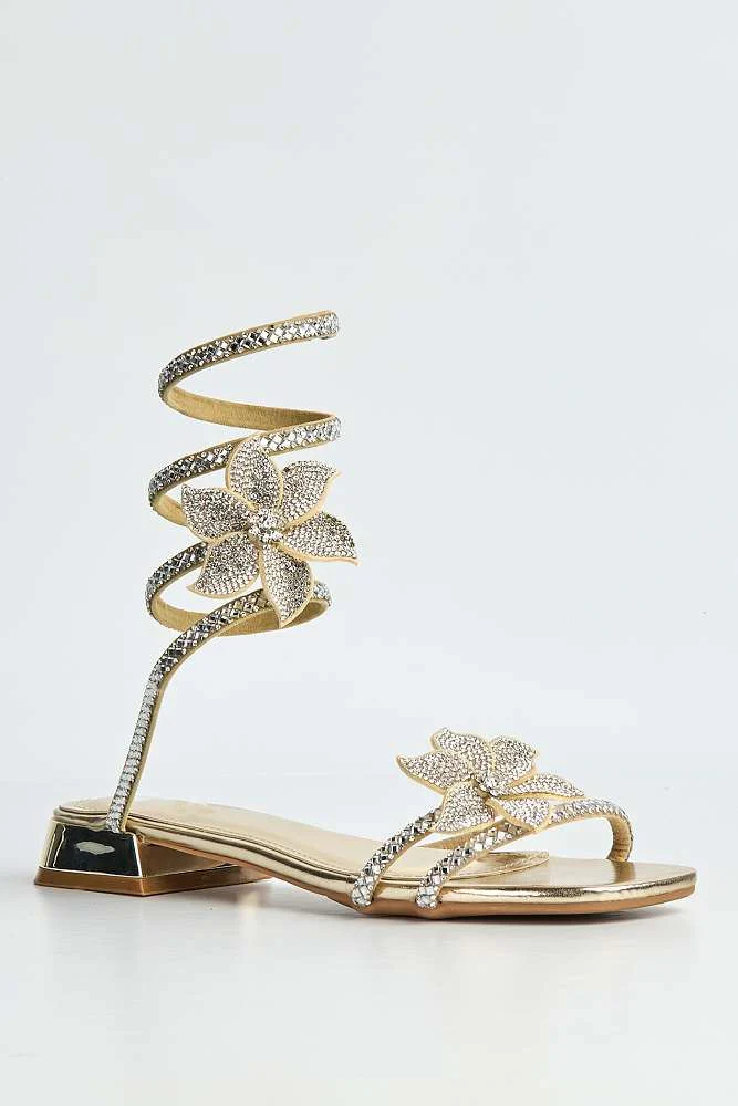 Tansel Diamante Flower Embellished Wrap Around Flat Sandals in Gold - Image 4