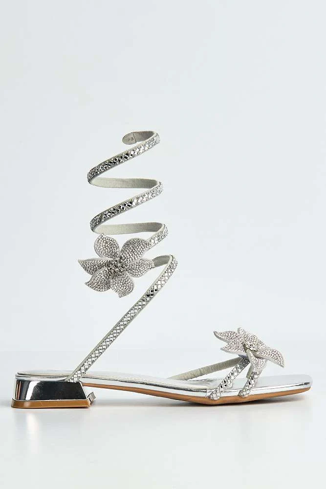 Tansel Diamante Flower Embellished Wrap Around Flat Sandals in Silver - Image 6